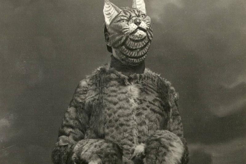 Photo from 1920 of a man dressed up as a cat for Halloween