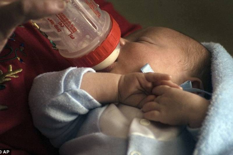 Jenni Lake's baby drinking milk