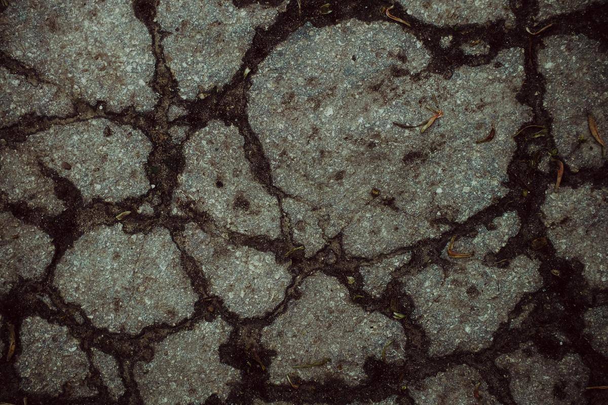 A close up of a road with bitumen.