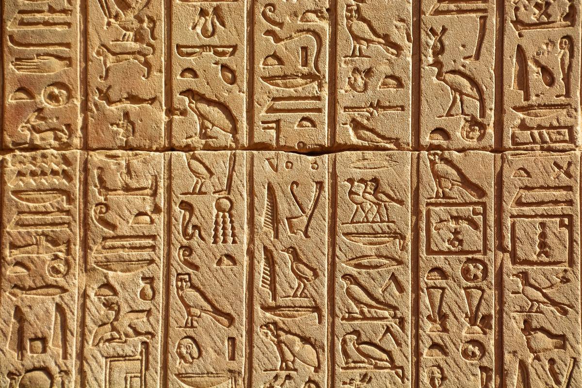 A wall carved in Ancient Egyptian Hieroglyphics.