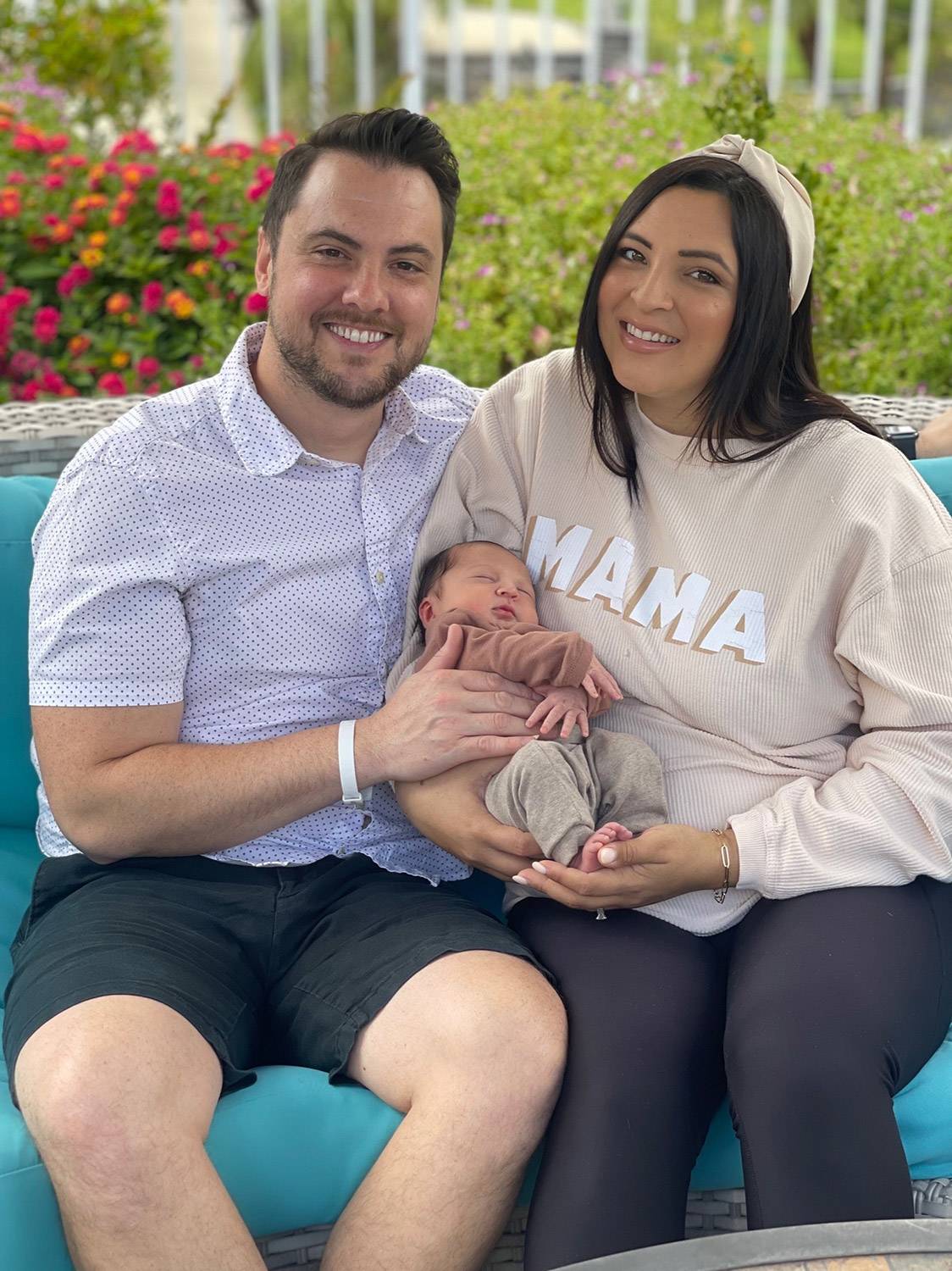 erin and zach holding Silas