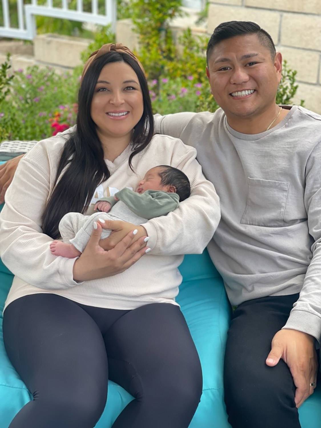 jill and ian holding Oliver