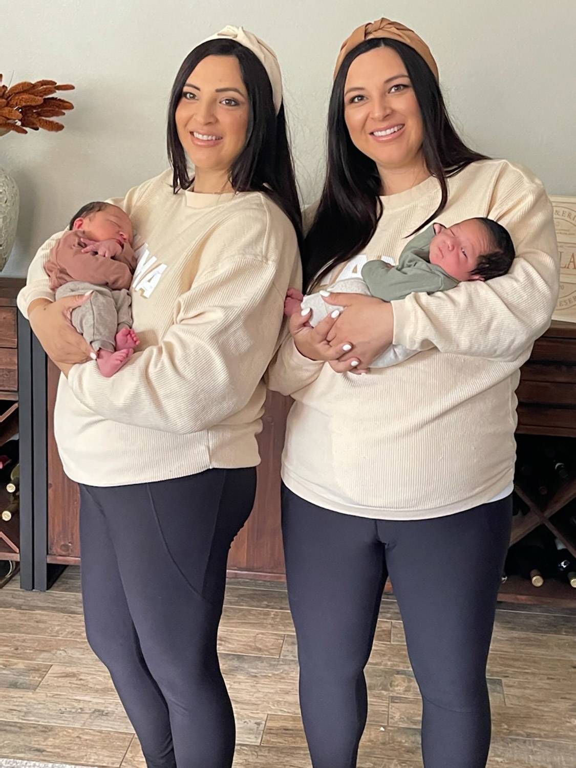 Erin and Jill holding their baby boys