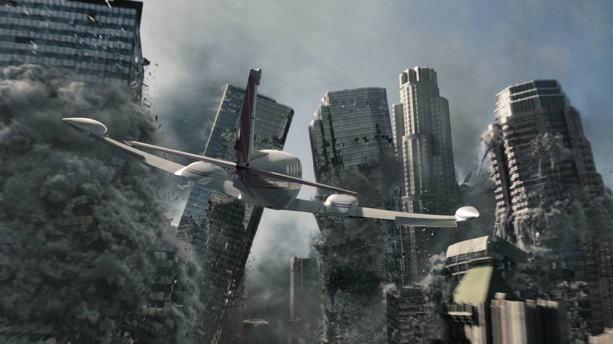 2012 Movie publicity still of plane flying over collapsing buildings