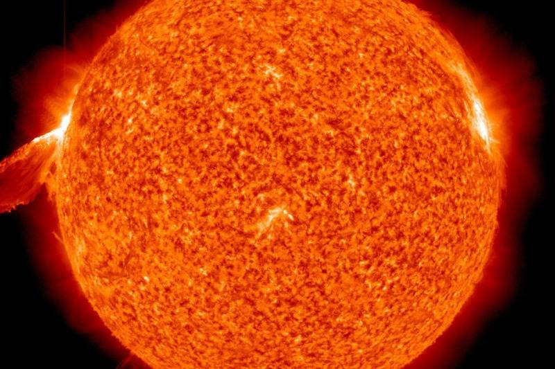 sun with solar flare closeup