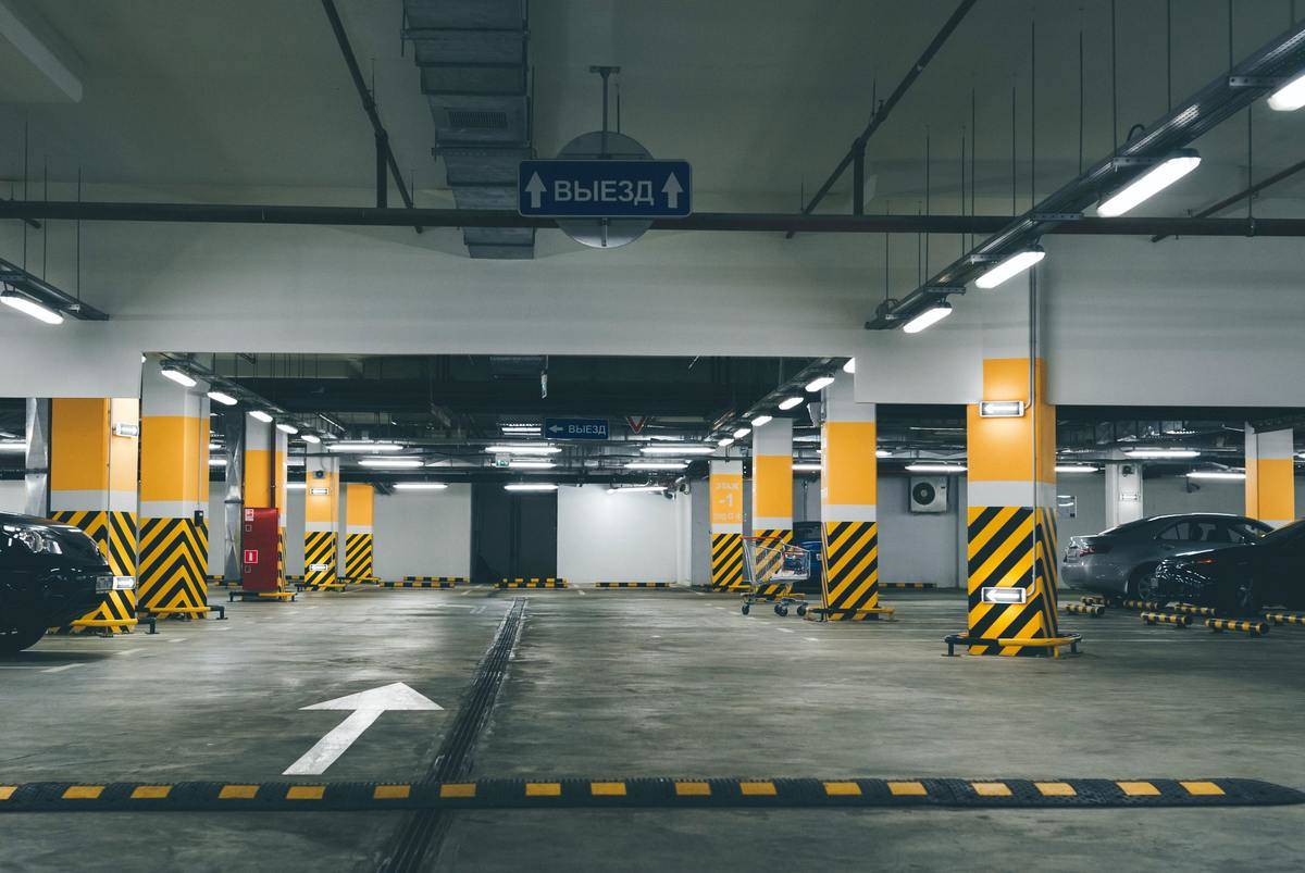 underground parking lot mostly empty
