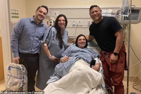 twins and husband at hospital bed