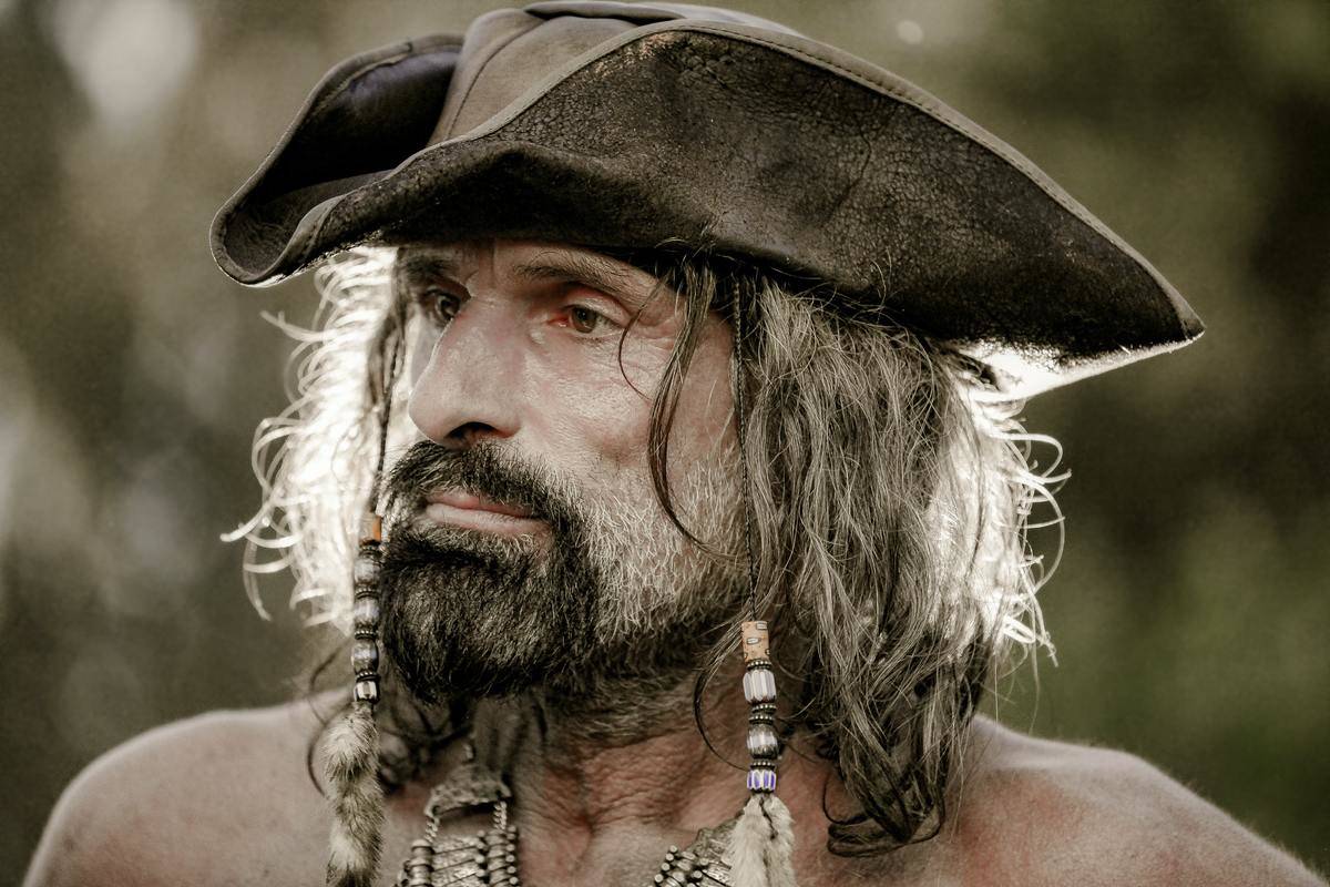 A man wearing a pirate hat.