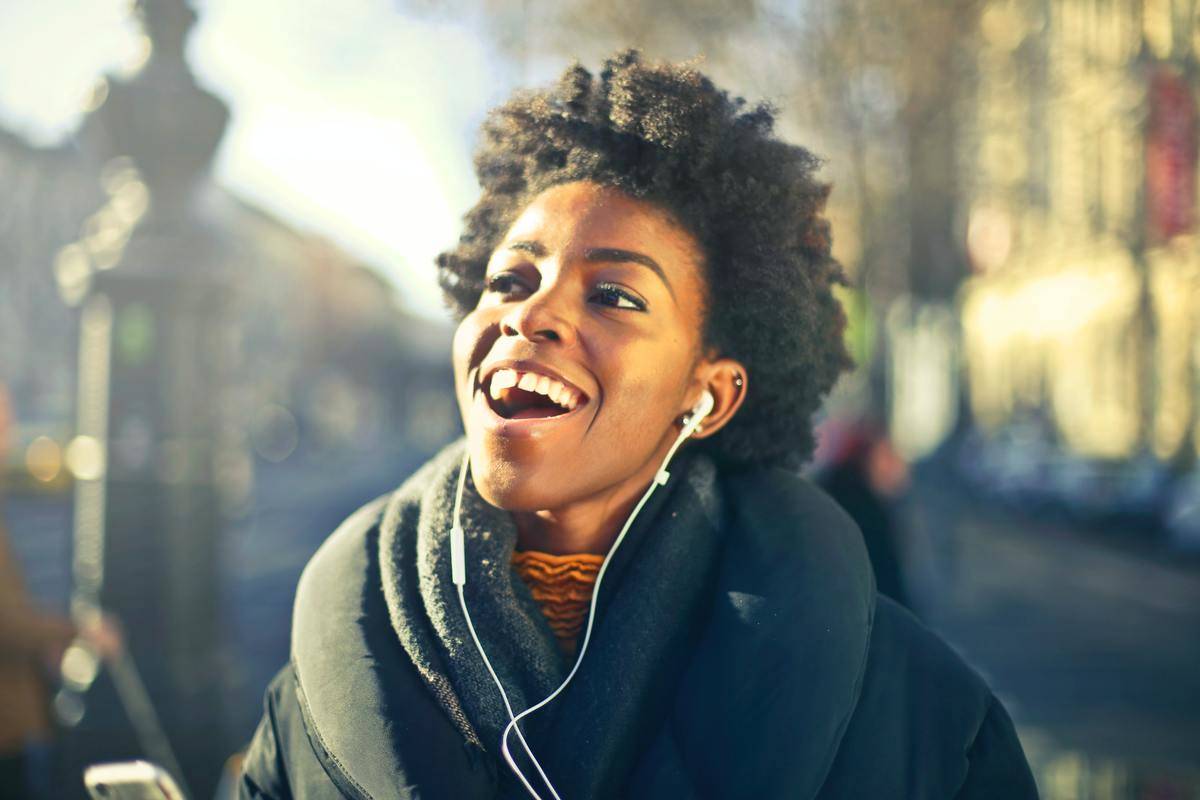 lose-up-photo-of-a-woman-listening-to-music