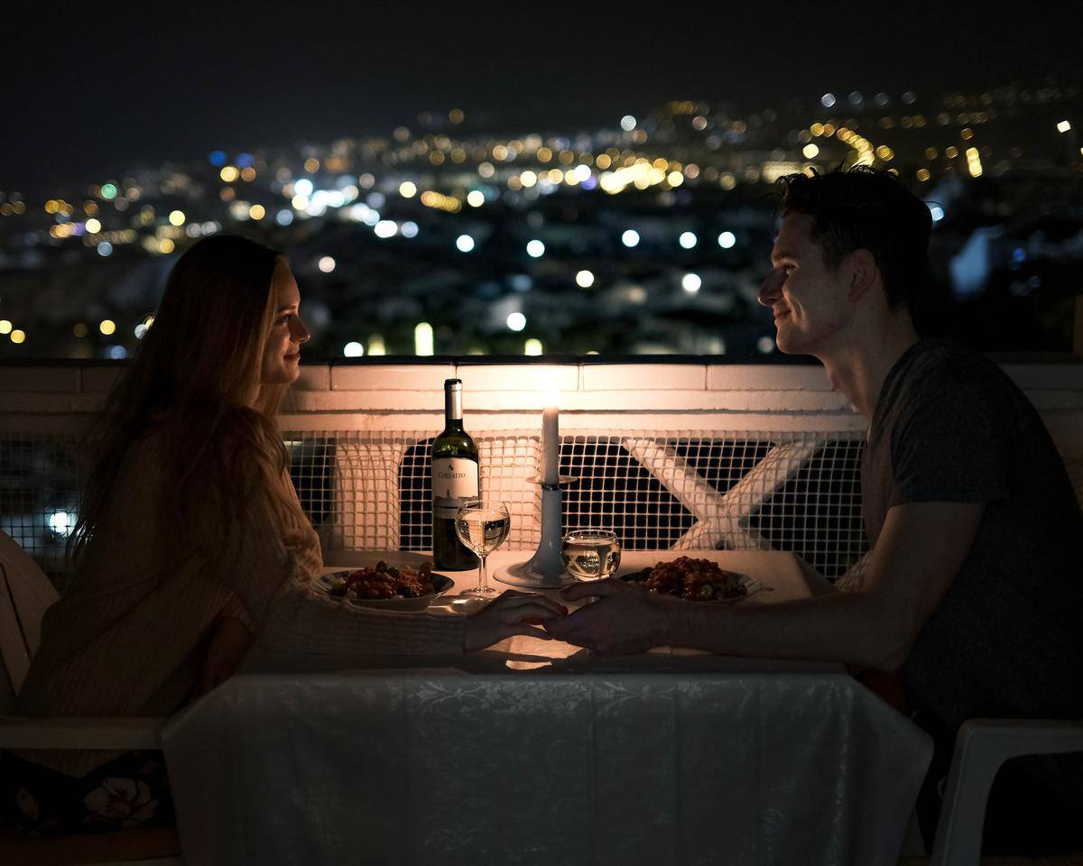 man-and-woman-dining on date at night