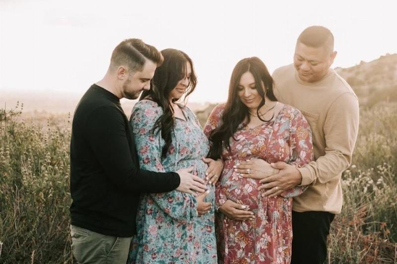 twins pregnant and husbands in photoshoot