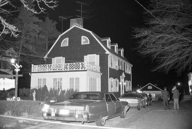 (Original Caption) View of the home of Ronald DeFeo Sr.,the car salesman, his wife, two daughters and two sons were found shot to death on 11/14/1974. Ronald DeFeo Jr., 23, the only surviving member of the family, who called the police to report the slayings, was being questioned by police. The Amityville Horror is based on this case.