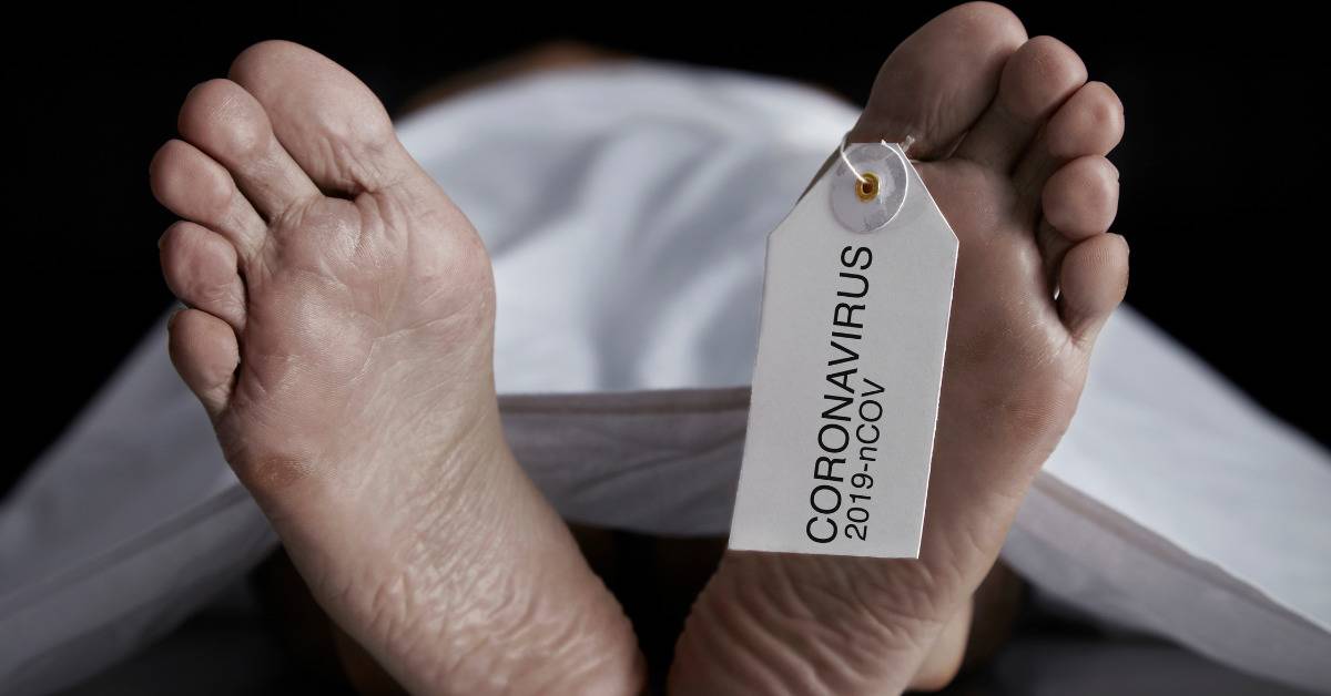 feet of man at morgue with "coronavirus" tag