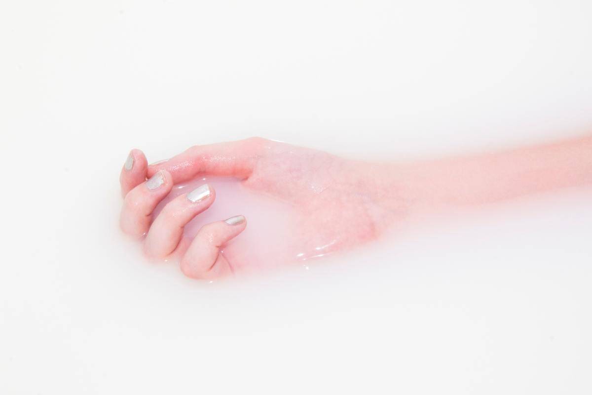 lifeless hand in foggy water