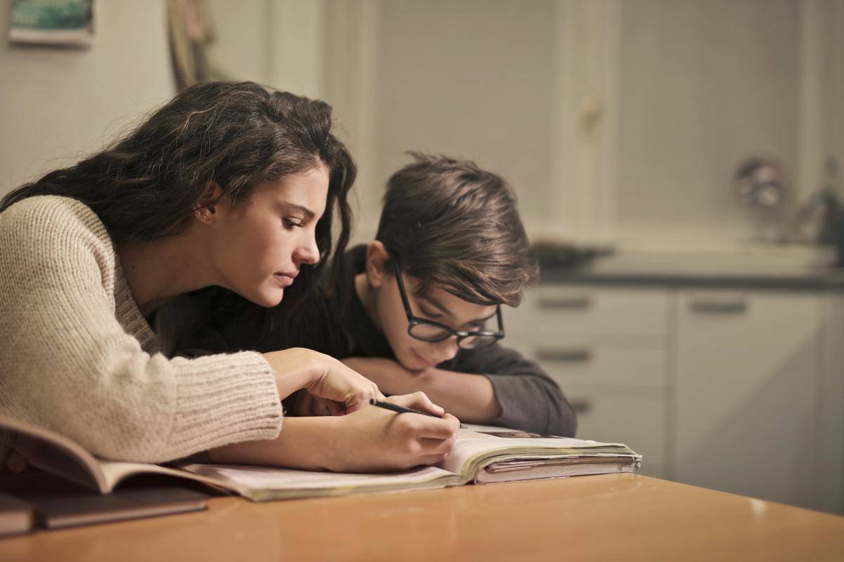 focused-students-doing-homework-at-home-