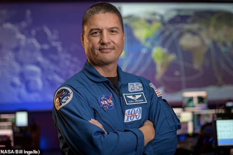 Astronaut posing in NASA Uniform