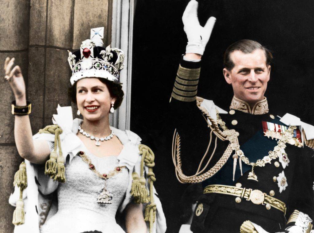 Queen Elizabeth II and the Duke of Edinburgh on the day of their coronation, Buckingham Palace, 1953. (Colorised black and white print). Artist Unknown.