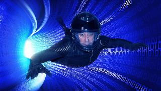 man in space suit traveling in mechanical tunnel