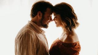 oving-couple-standing-close-in-room