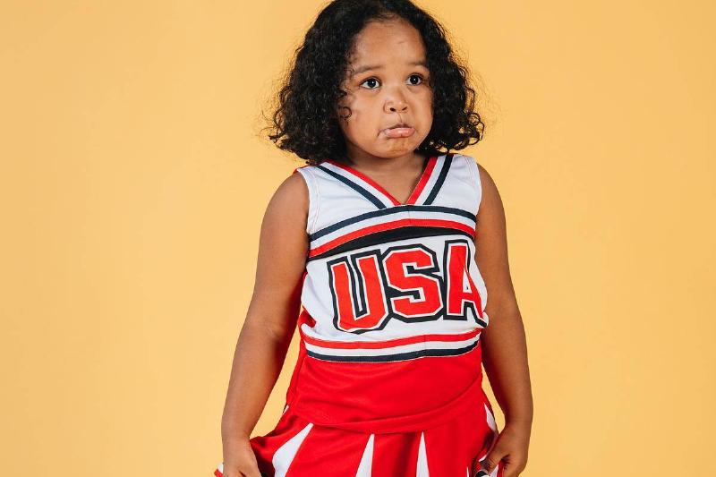 sad-black-girl-in-cheerleader-uniform