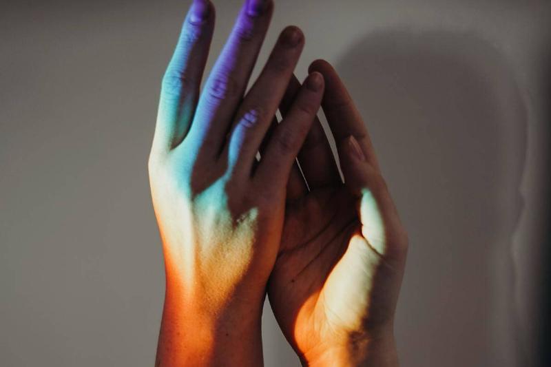 photo-of-persons-hands with colors-doing-high-five