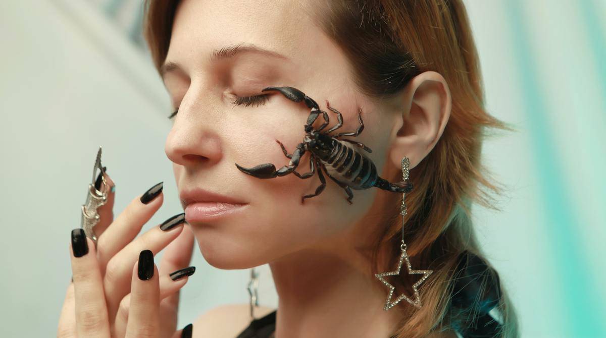 photo-of-scorpion-on-woman-s-face