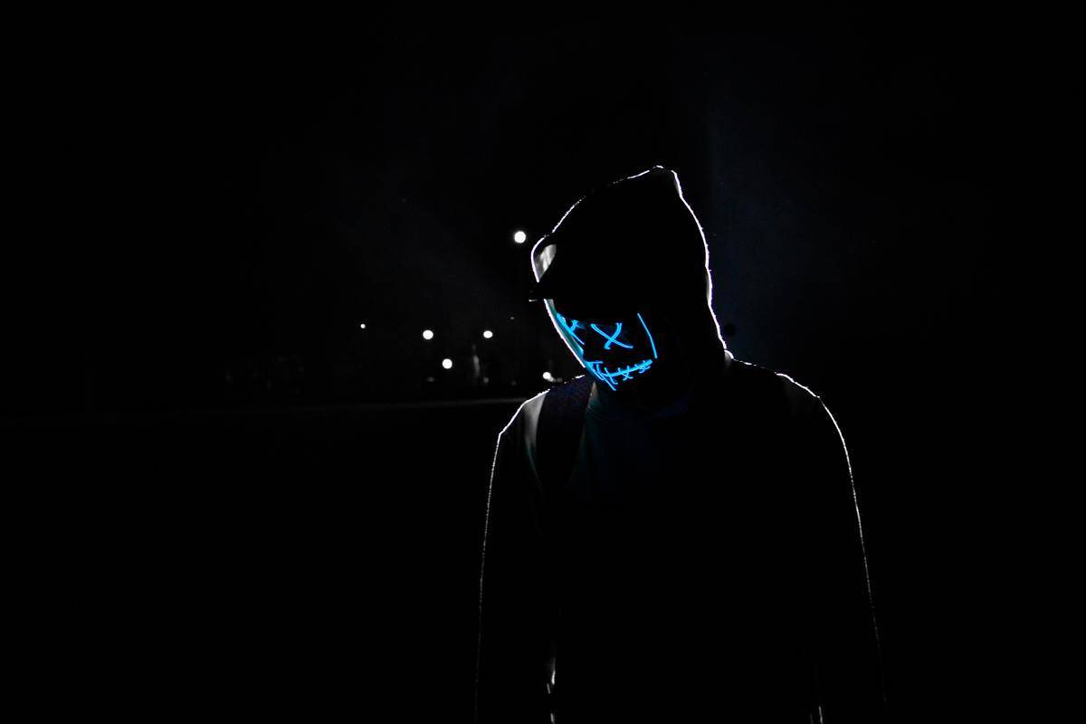 silhouette-of-man with xmask on