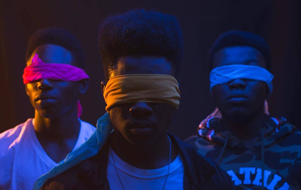 unrecognizable-black-gang-in-blindfolds-on-dark-background-
