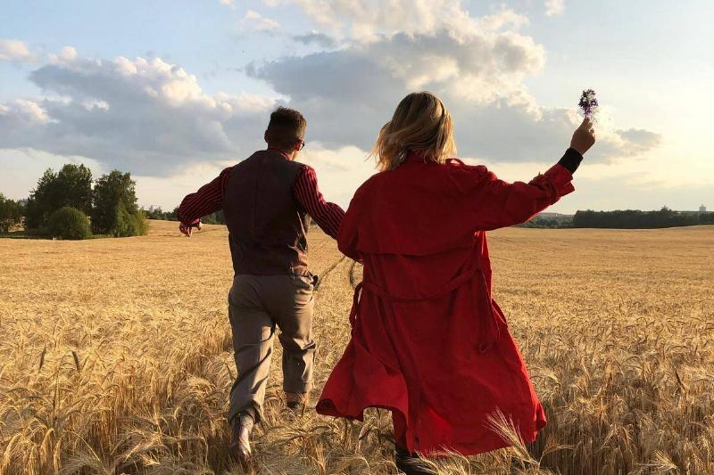ck-view-of-a-romantic-couple-running-in-the-middle-of-the-wheat-field-