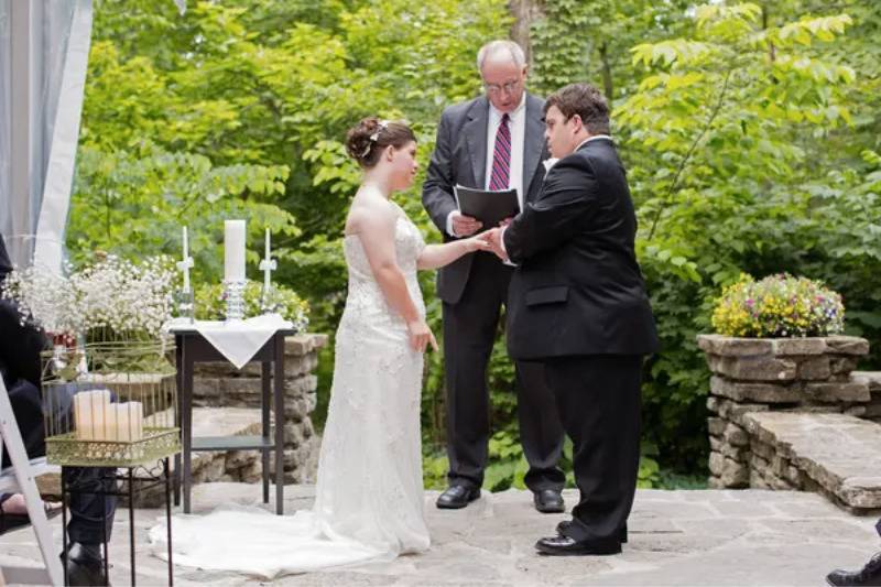wedding ceremony with bride and groom sharing vows