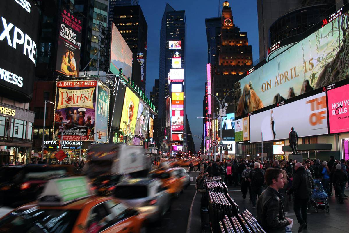 new-york-times-square- at night with moving cars
