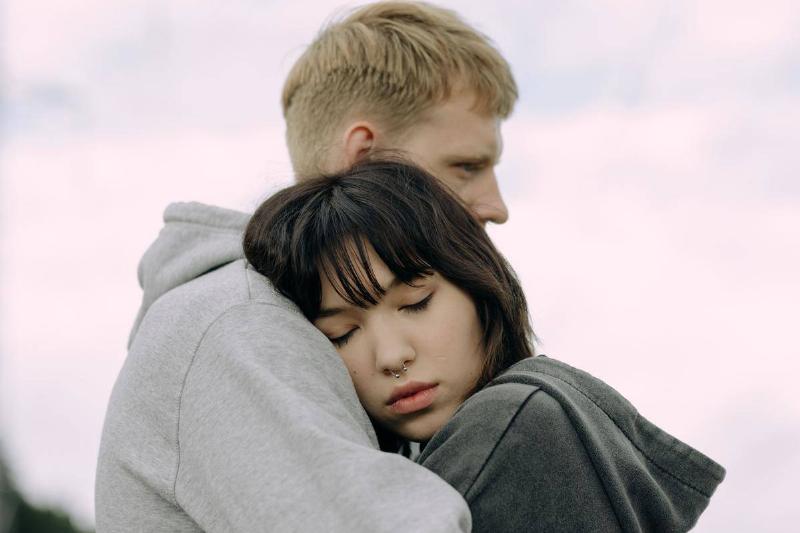 a-couple-hugging-each-other- under sky i hoodies