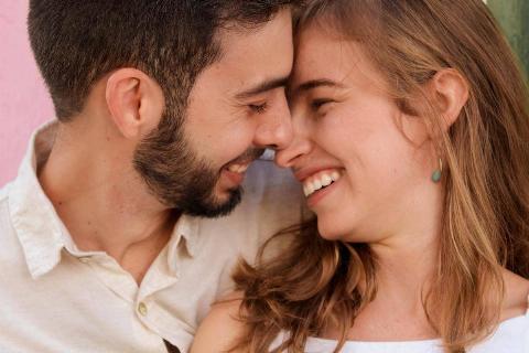 lose-up-photo-of-a-happy-couple-facing-each-other-