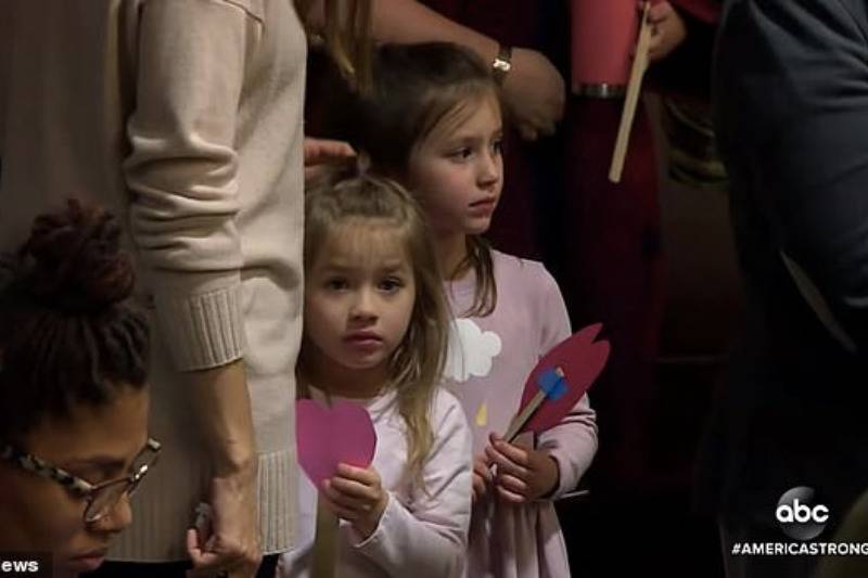 Classmates attend Michael's adoption hearing in a Michigan courthouse on Kent County's annual Adoption Day