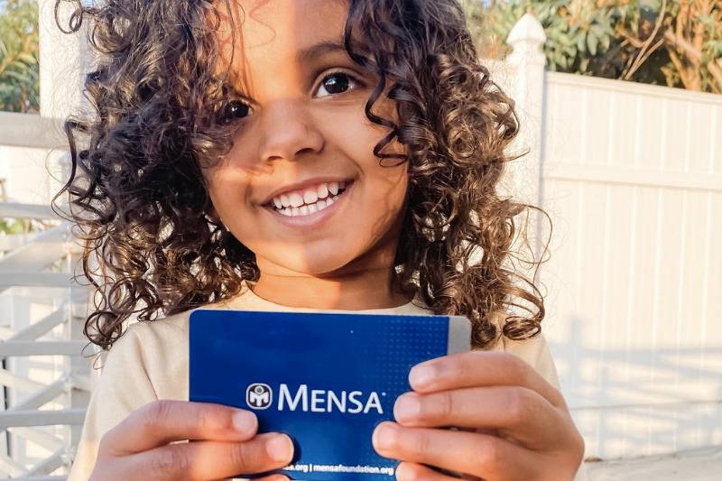 two year old holding mensa membership
