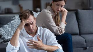 pensive-upset-couple-in-living-room-at-home-2022-11-01-23-39-23-utc