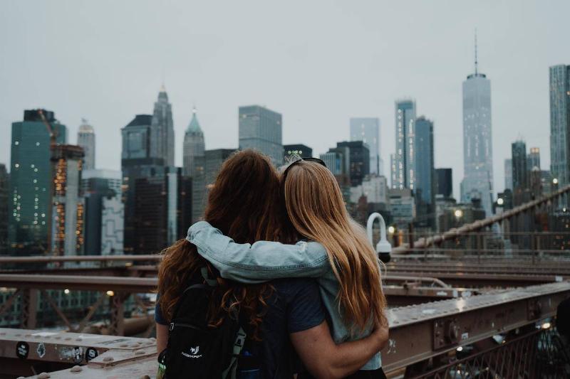 two woman-enjoying-the-view-of-the-new-york-city-skyline