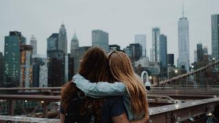 two woman-enjoying-the-view-of-the-new-york-city-skyline