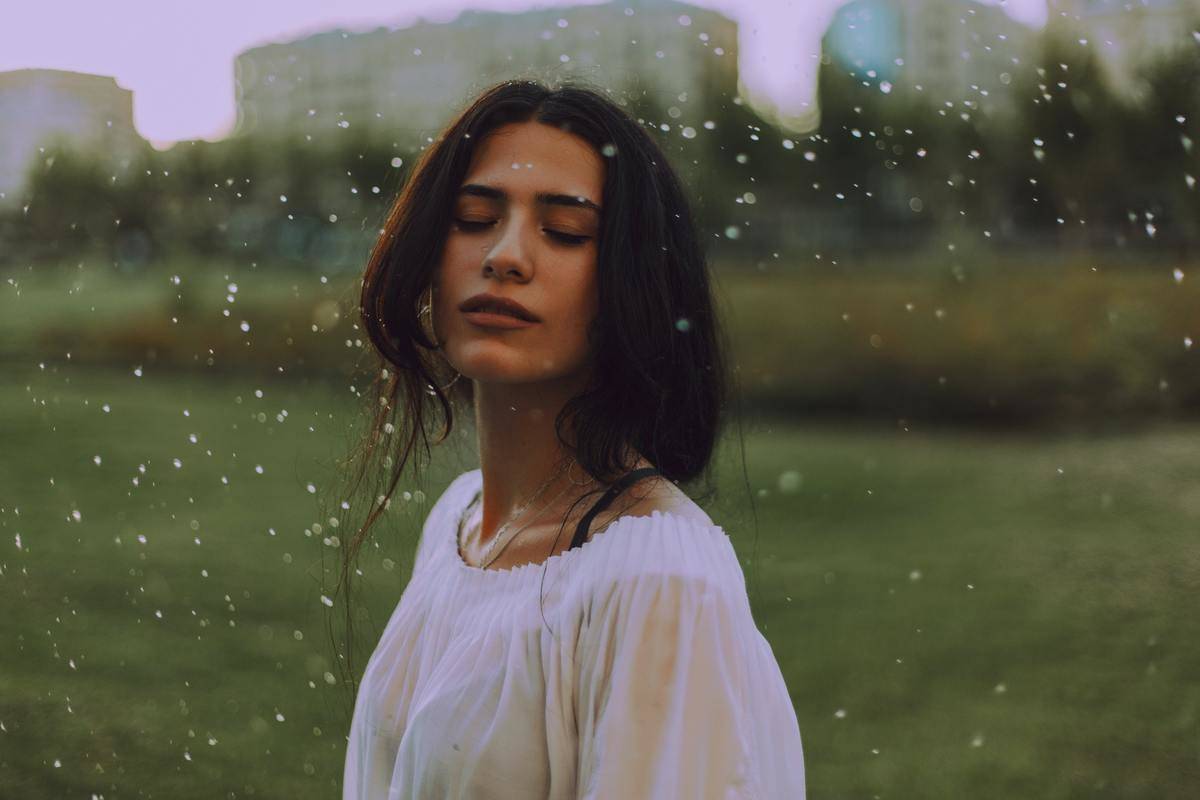 woman-in-white-shirt-with-green-background