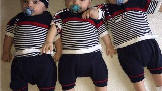 babies in matching sailor outfits