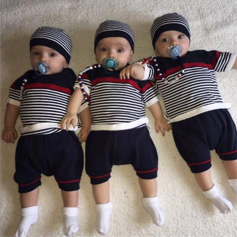 babies in matching sailor outfits