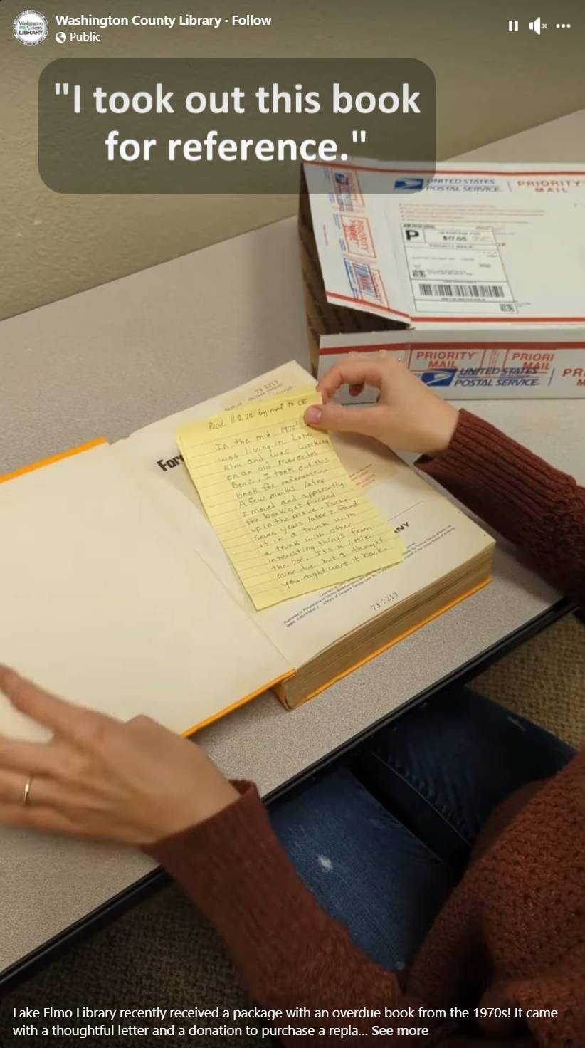 A screenshot from the library's video of the book, showing the letter inside.