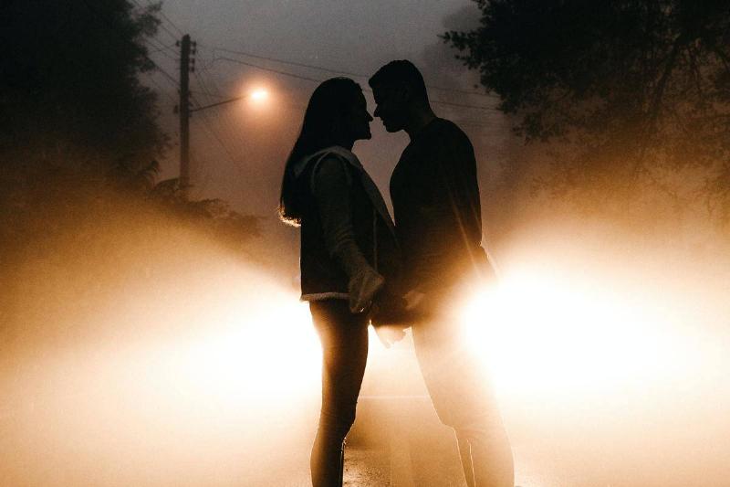 photo-of-couple-standing-on-road