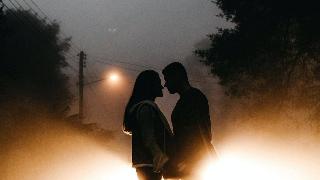 photo-of-couple-standing-on-road