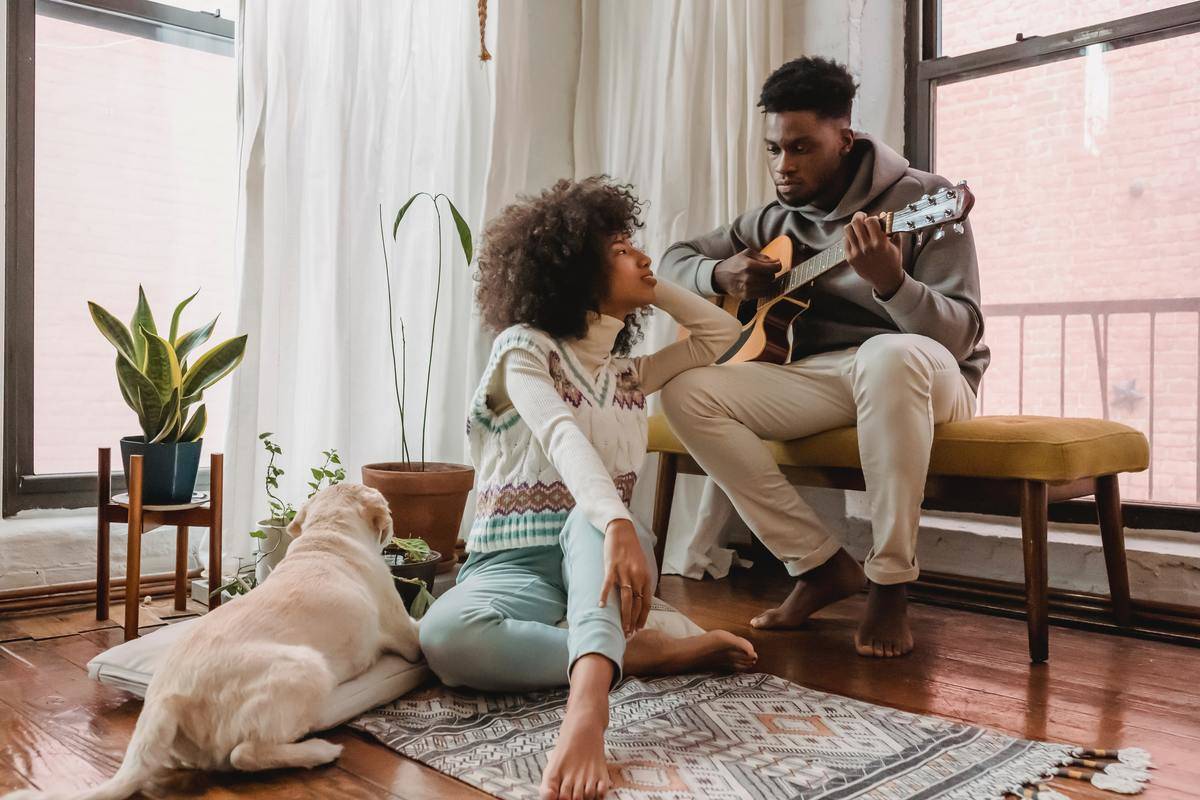 lack-couple-with-guitar-near-dog