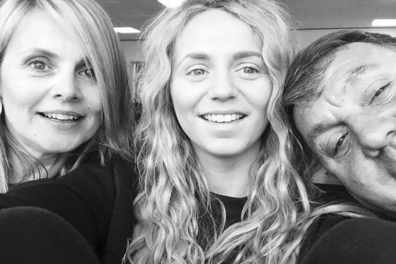 jessica takes selfie with her parents in black and white