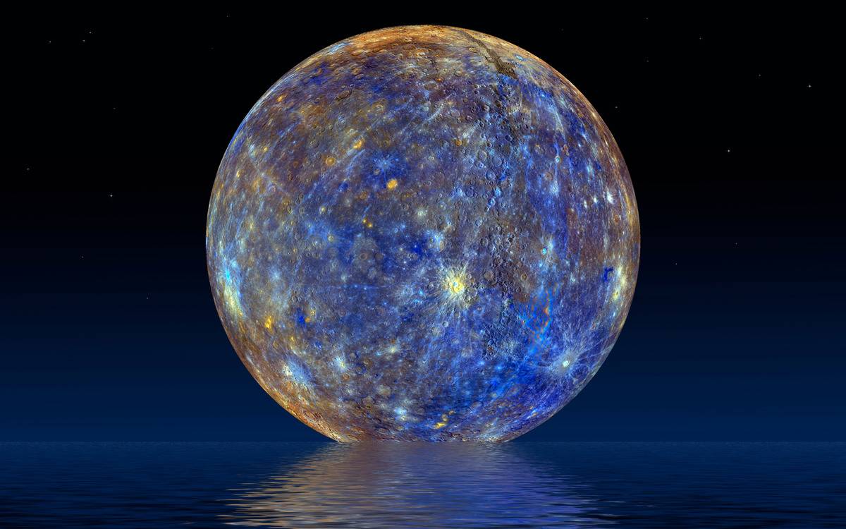 The planet Mercury hung in the sky above a body of water in which you can see its reflection.