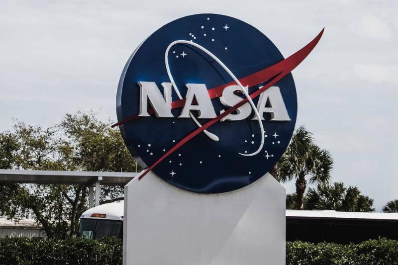 A signpost featuring the NASA logo.