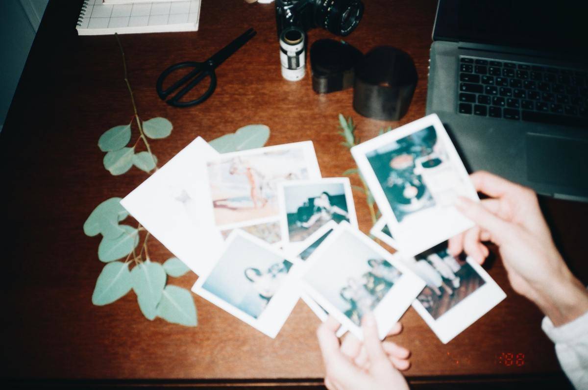 polaroid pictures on a desk