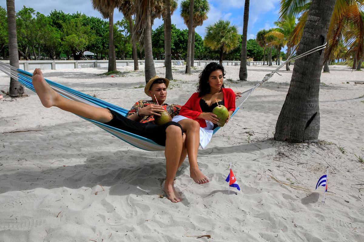 a-couple-sitting-on-the-hammock